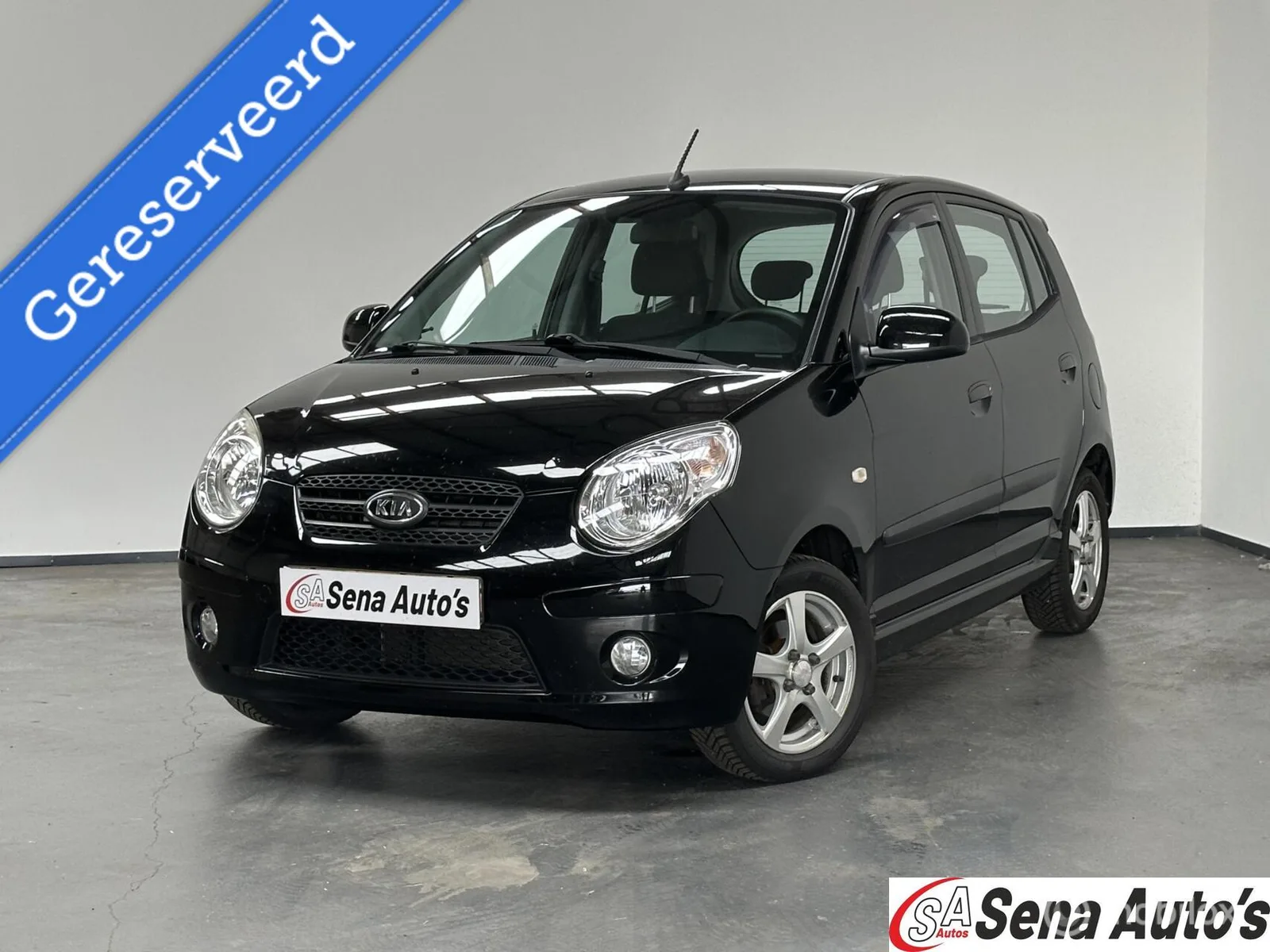 Kia Picanto (2012) — foto 1