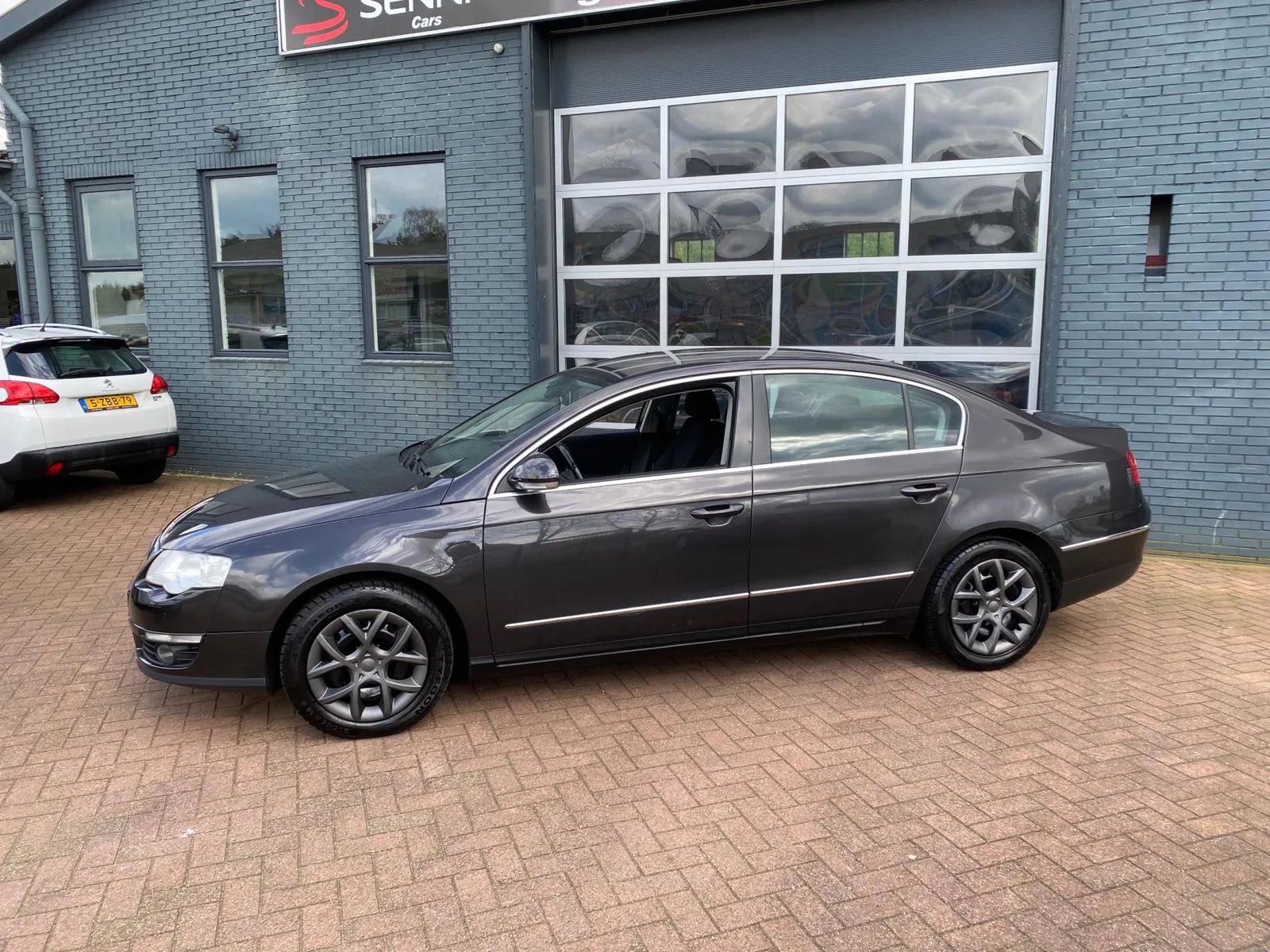 Volkswagen Passat (2010) — foto 1