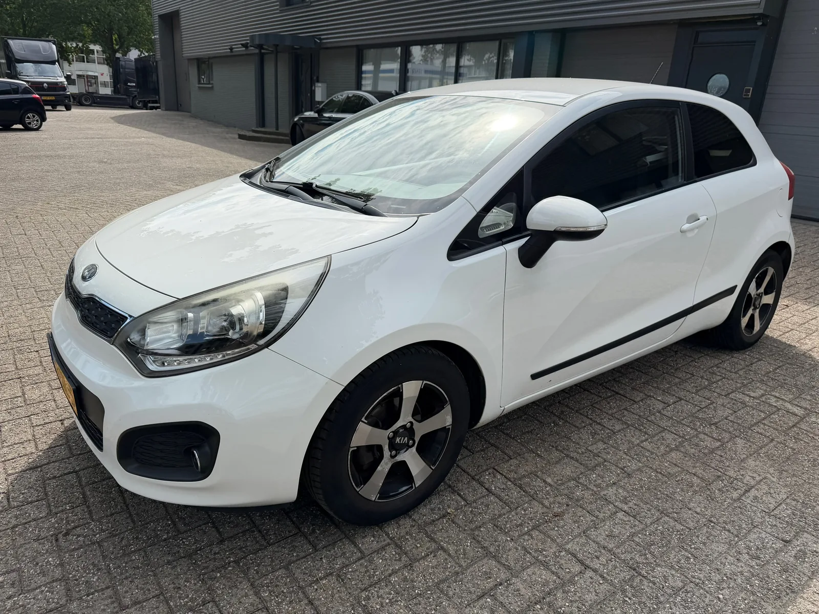Kia Rio (2013) — foto 1