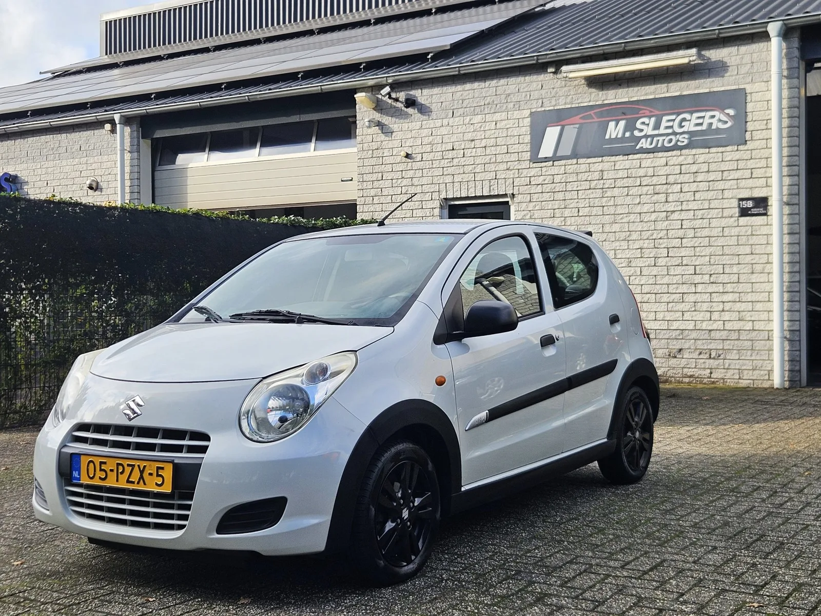 Suzuki Alto (2011) — foto 1