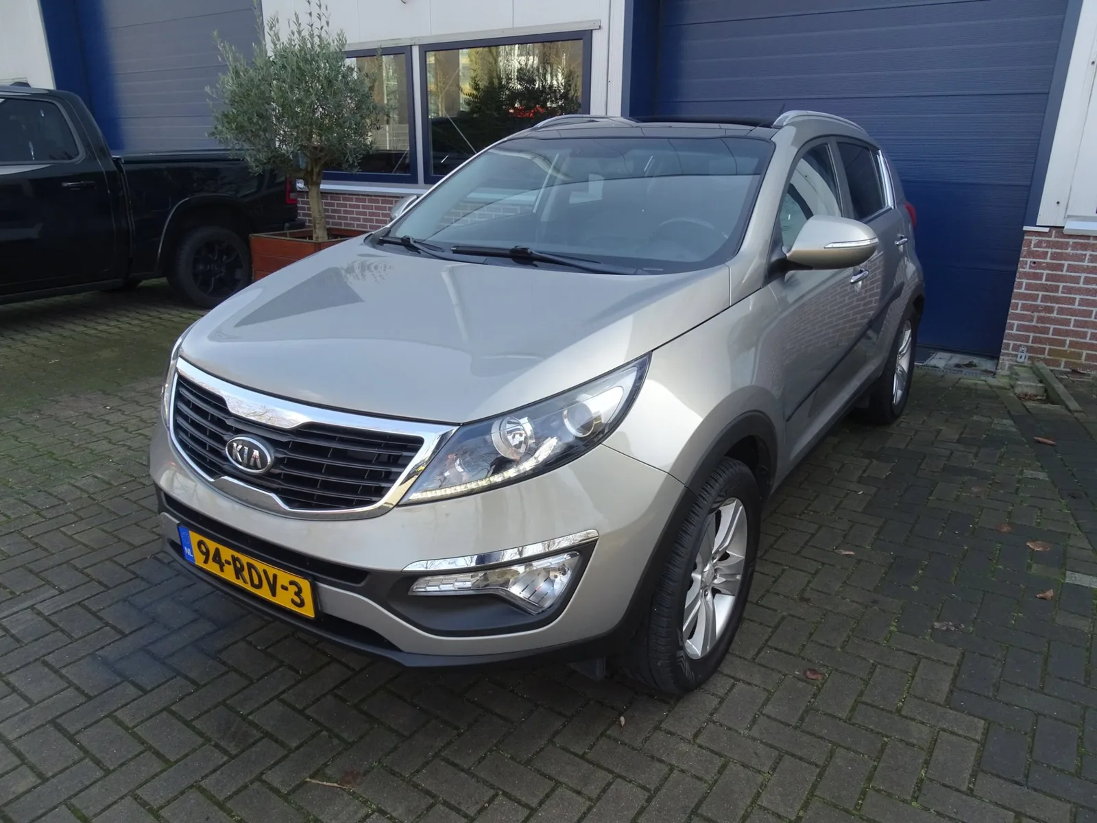 Kia Sportage (2011) — foto 1