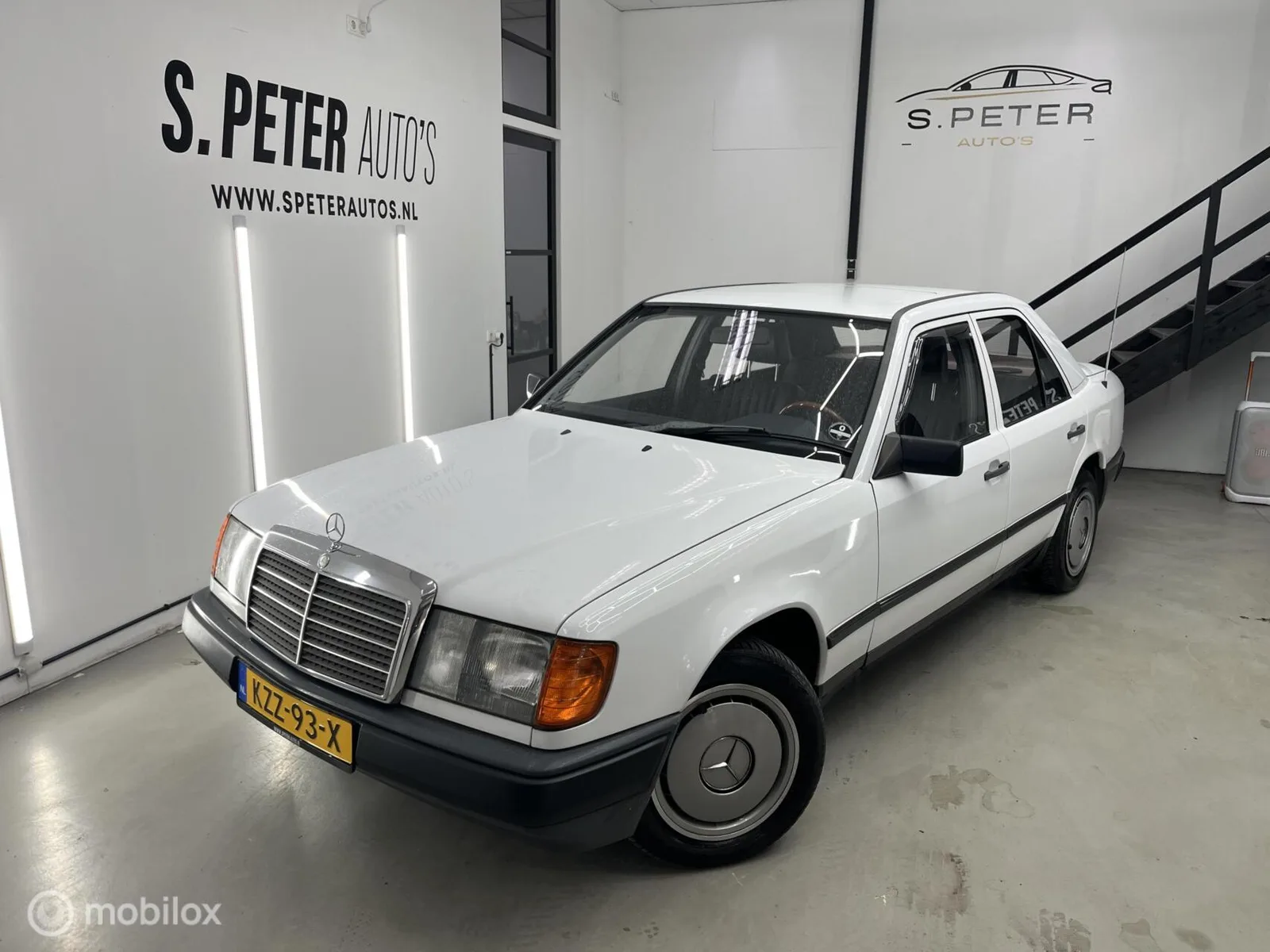 Mercedes-Benz 200-Serie (1986) — foto 1