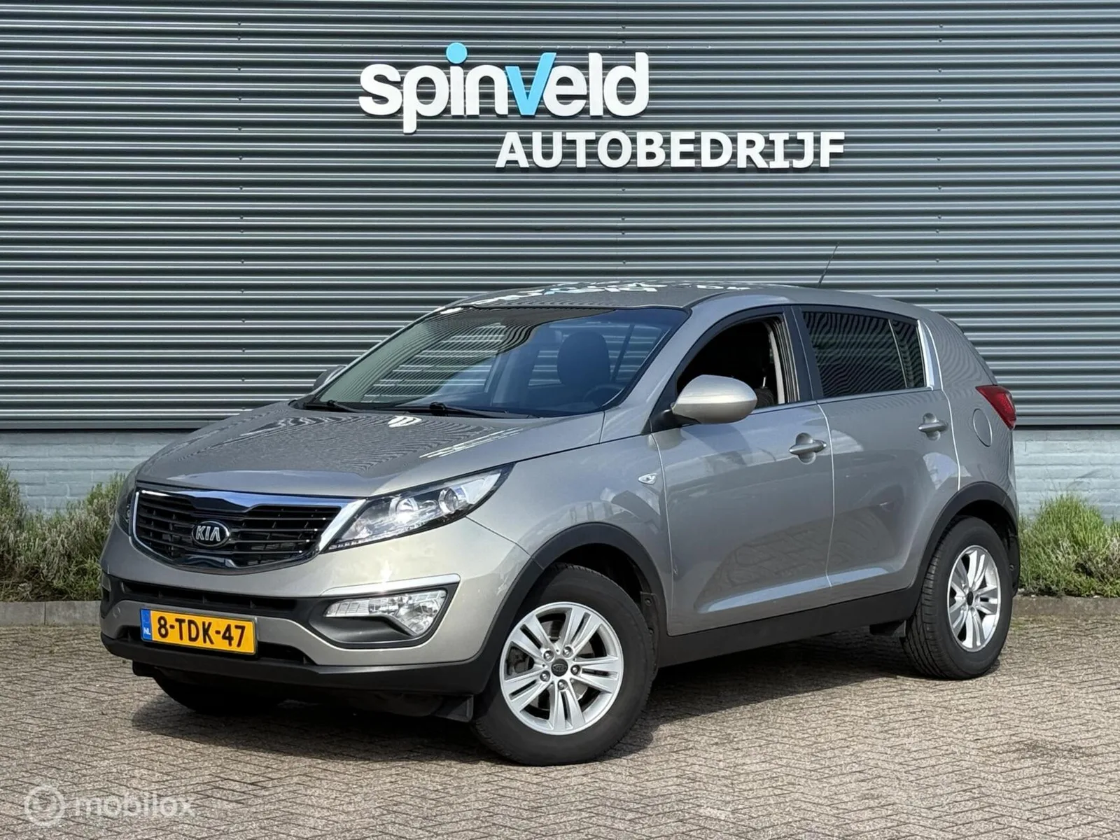 Kia Sportage (2013) — foto 1