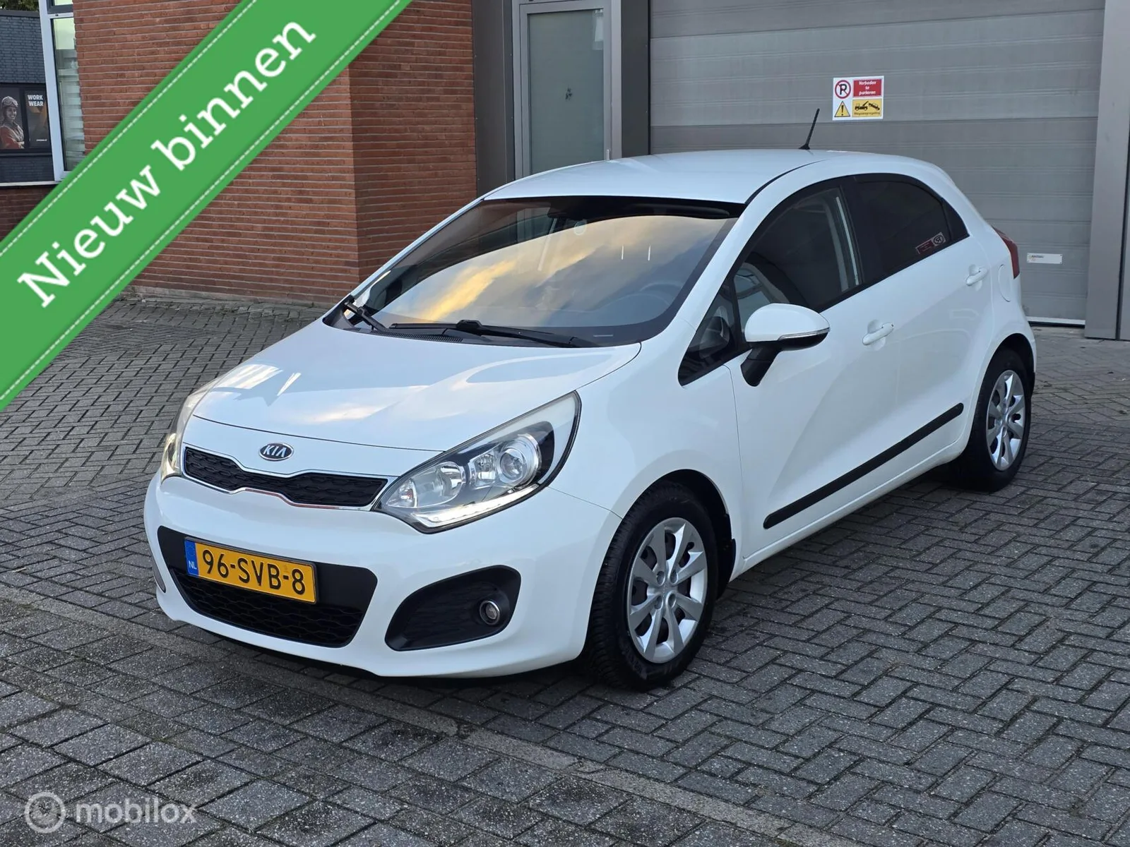 Kia Rio (2012) — foto 1
