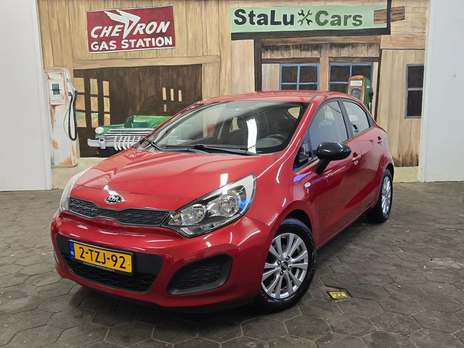 Kia Rio (2014) — foto 1