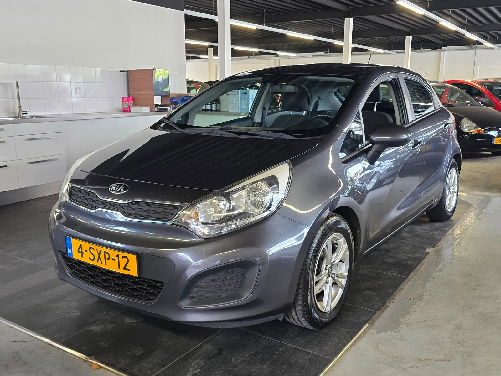 Kia Rio (2014) — foto 1