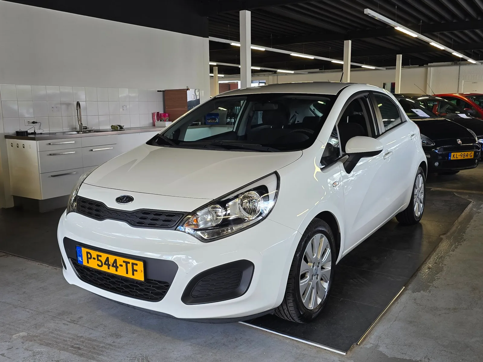 Kia Rio (2012) — foto 1