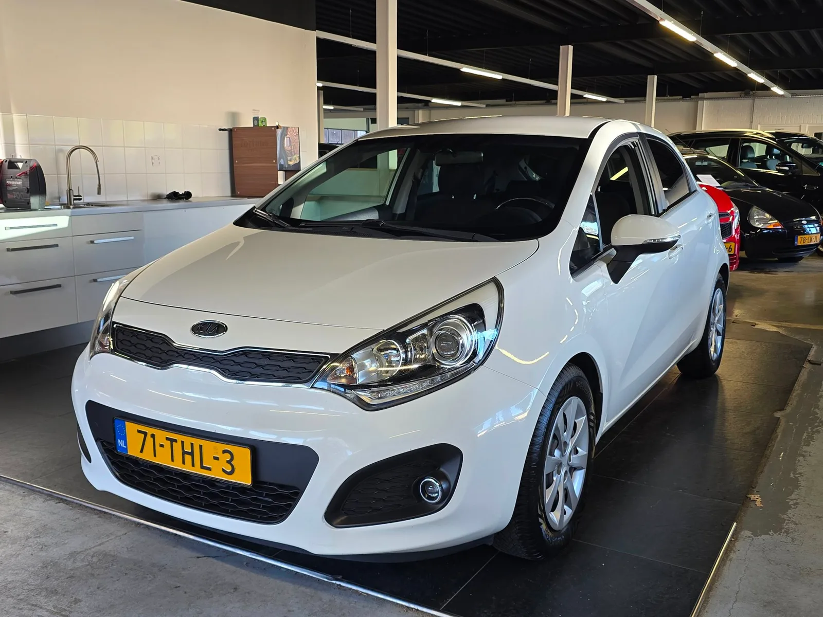 Kia Rio (2012) — foto 1