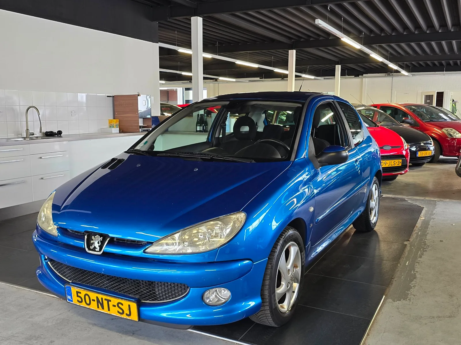 Peugeot 206 (2004) — foto 1