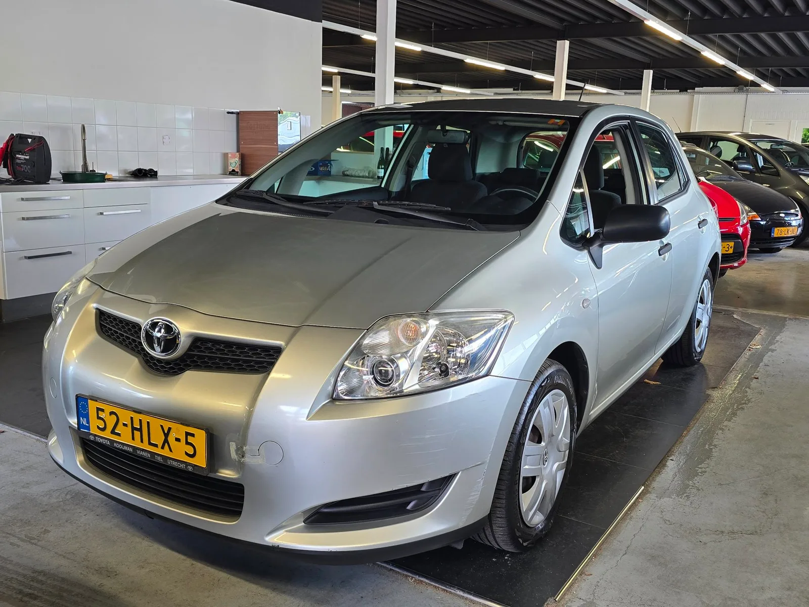 Toyota Auris (2009) — foto 1