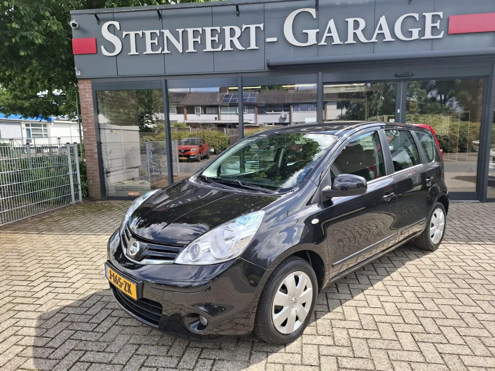 Nissan Note (2010) — foto 1