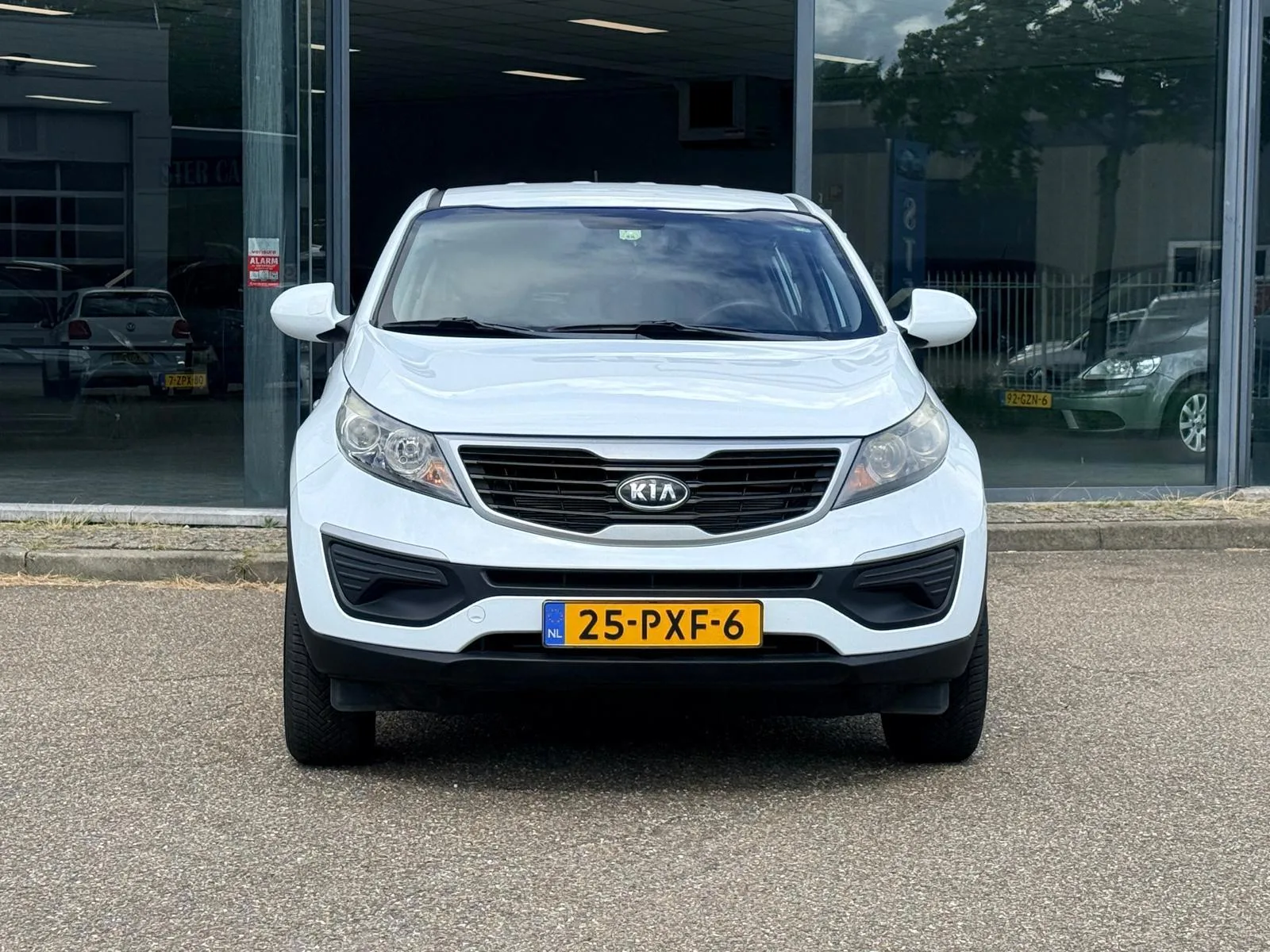 Kia Sportage (2011) — foto 1