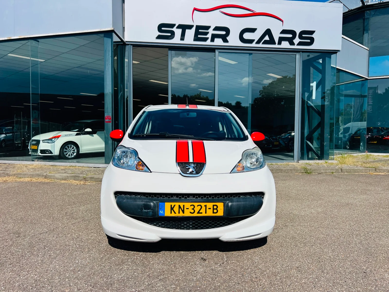 Peugeot 107 (2009) — foto 1