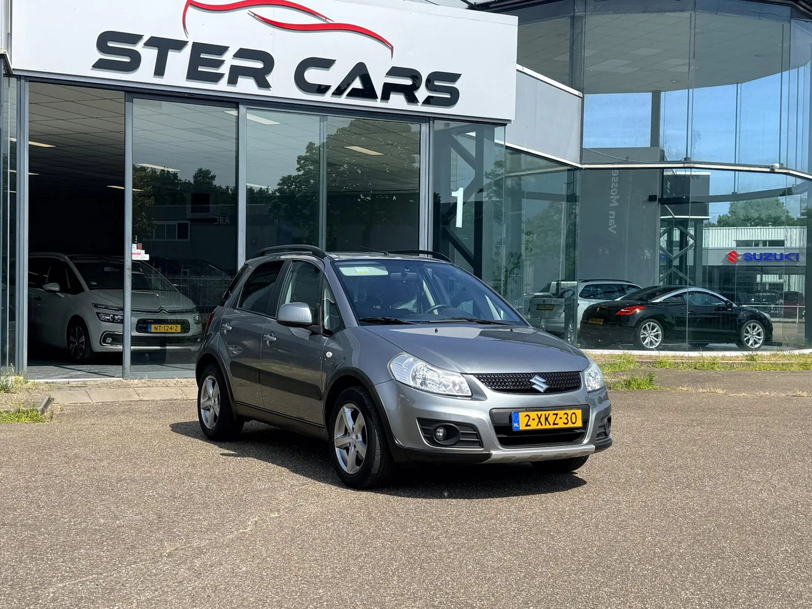Suzuki SX4 (2011) — foto 1