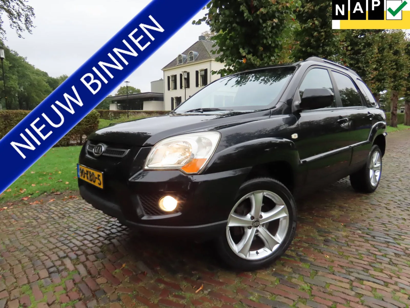 Kia Sportage (2009) — foto 1
