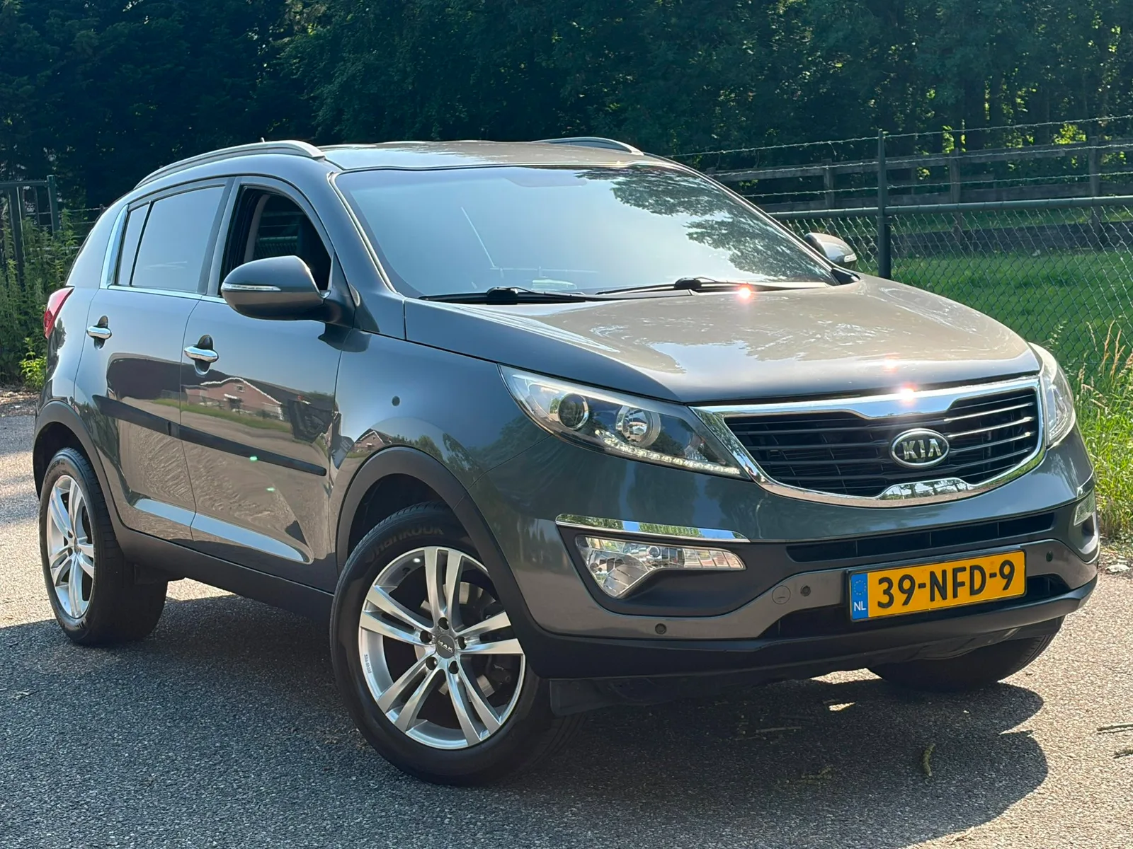 Kia Sportage (2010) — foto 1