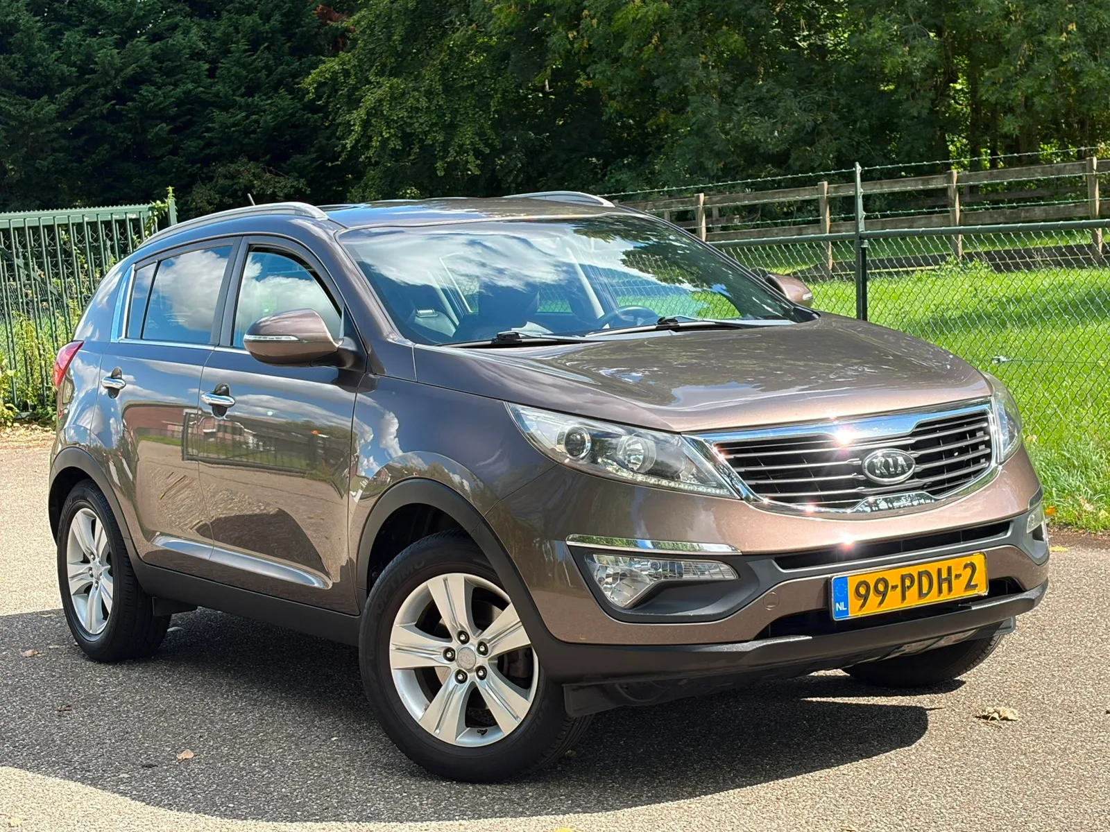 Kia Sportage (2011) — foto 1