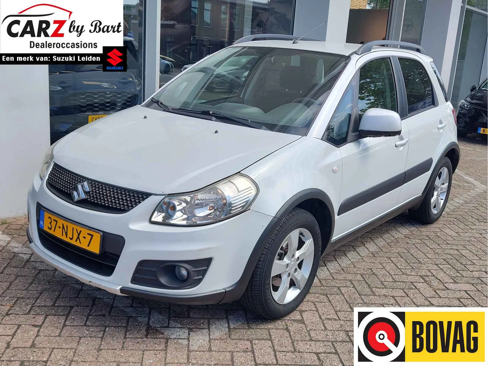 Suzuki SX4 (2010) — foto 1