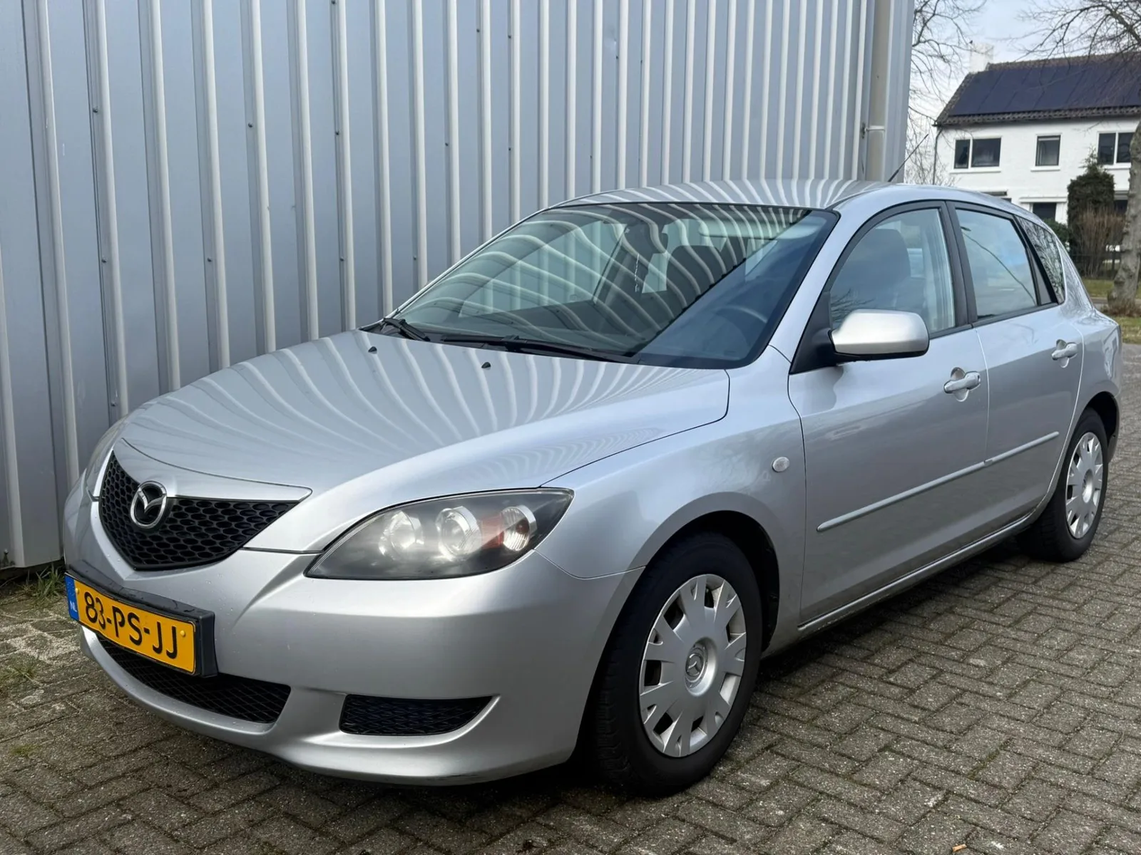 Mazda 3 (2004) — foto 1