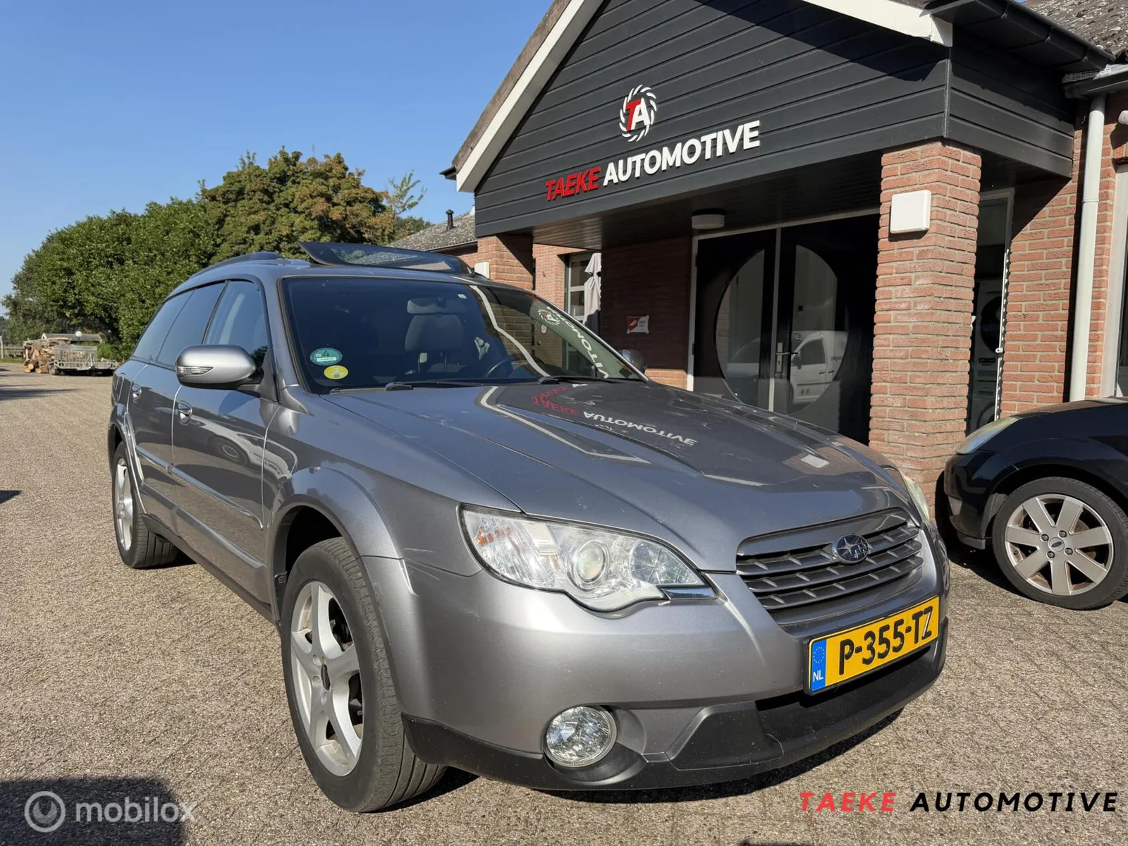 Subaru Legacy (2009) — foto 1