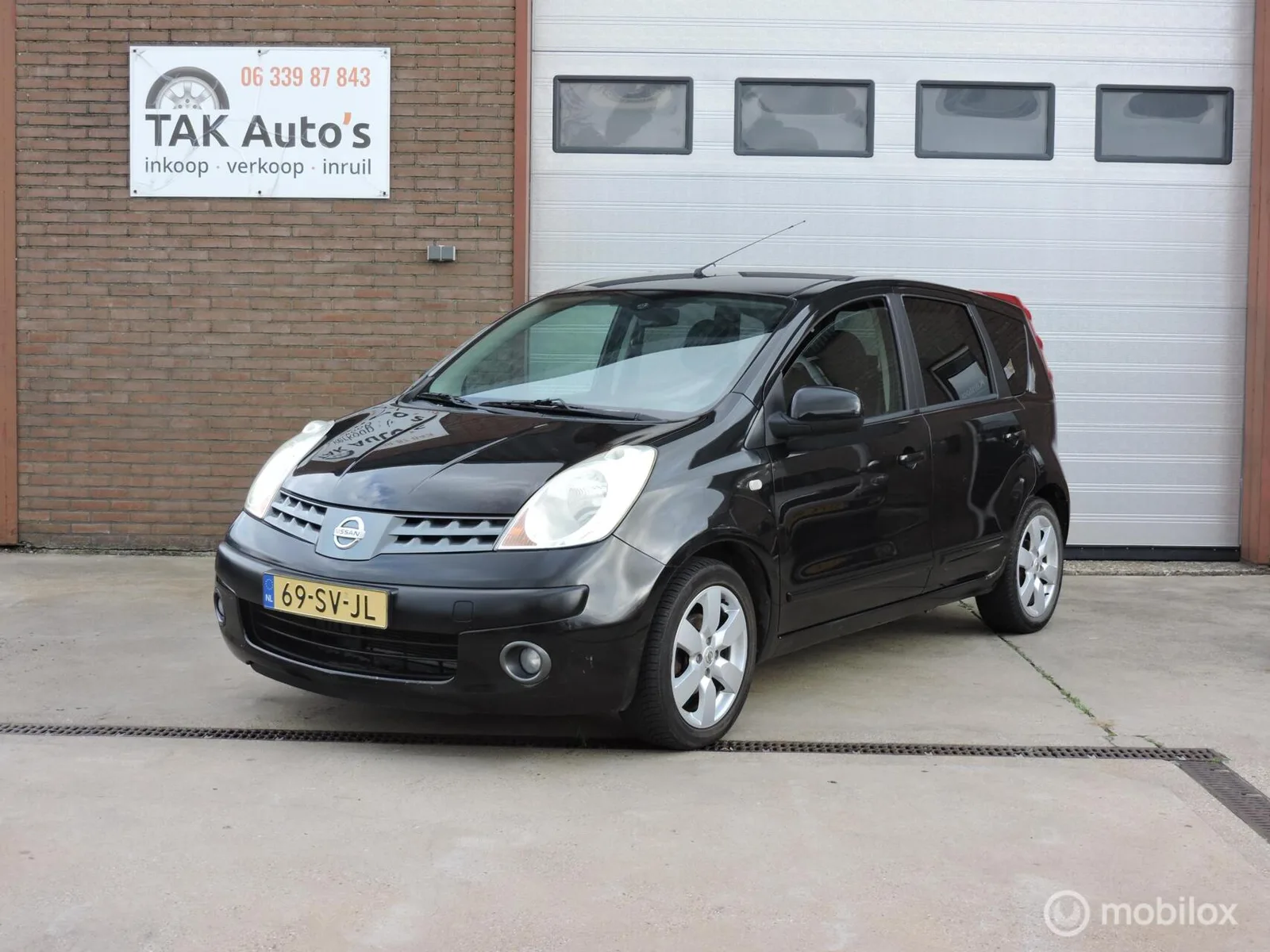 Nissan Note (2006) — foto 1