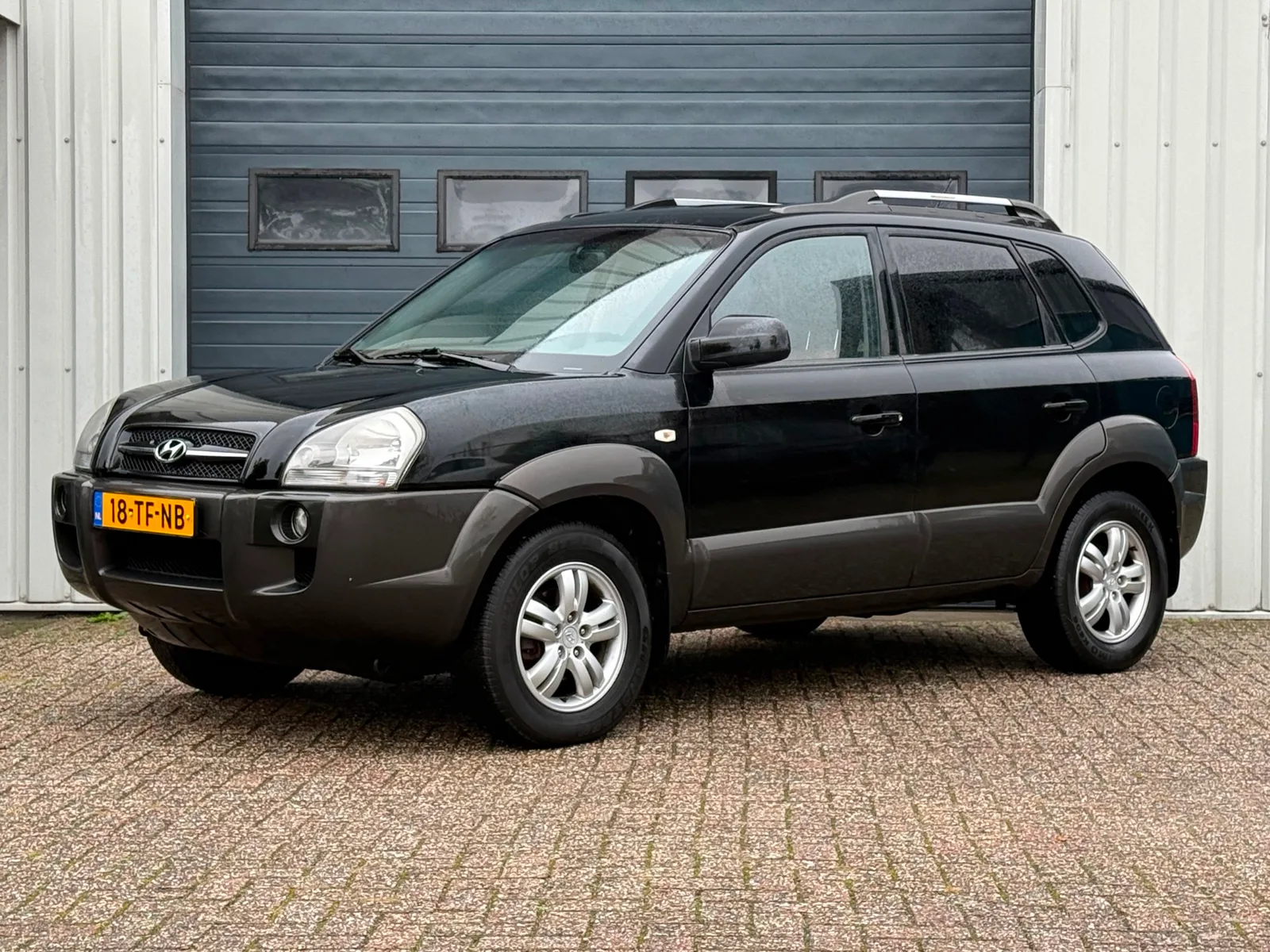 Hyundai Tucson (2006) — foto 1