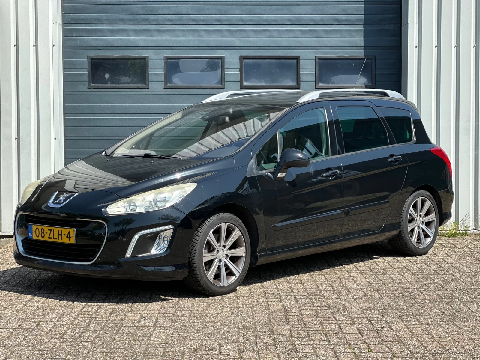 Peugeot 308 (2013) — foto 1