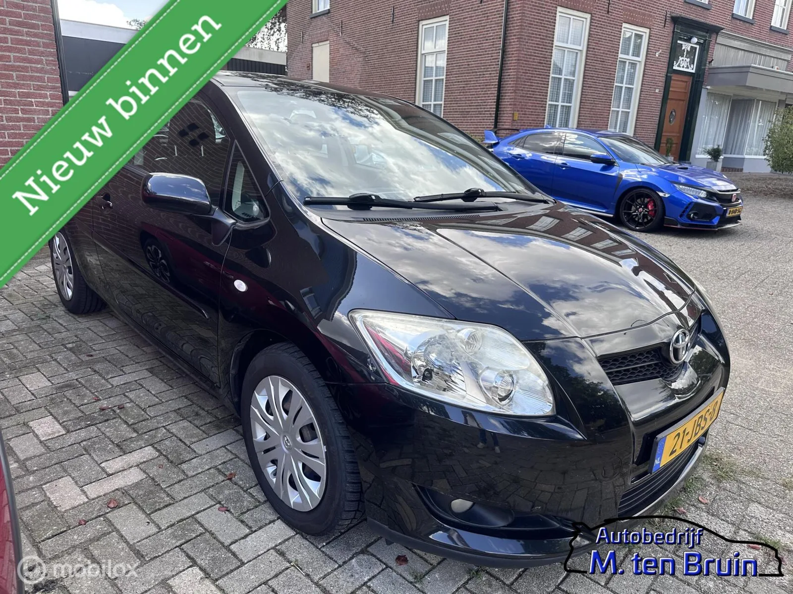 Toyota Auris (2009) — foto 1
