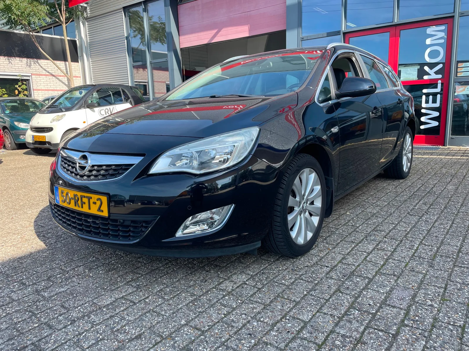 Opel Astra (2011) — foto 1