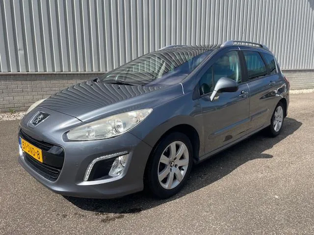 Peugeot 308 (2011) — foto 1