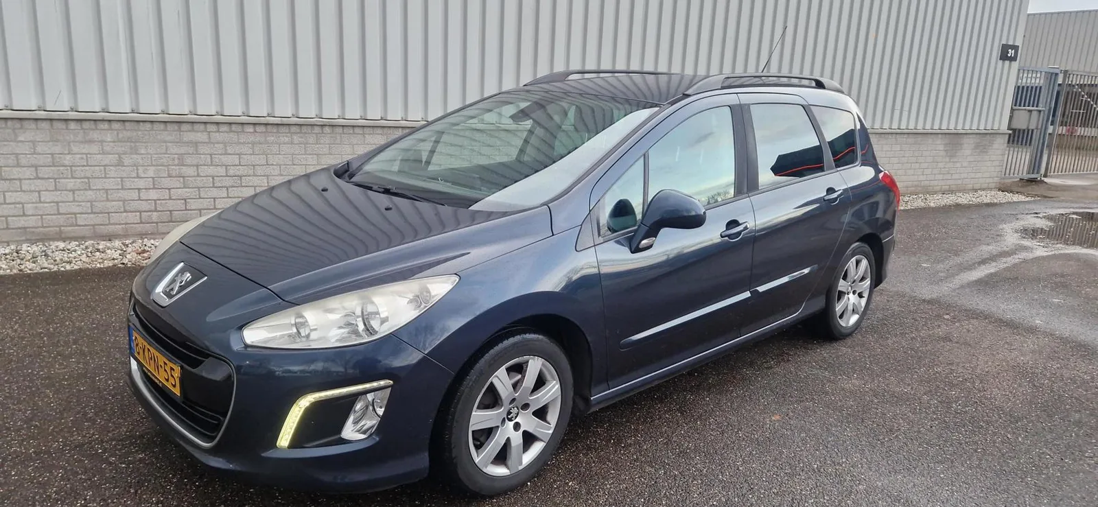 Peugeot 308 (2013) — foto 1