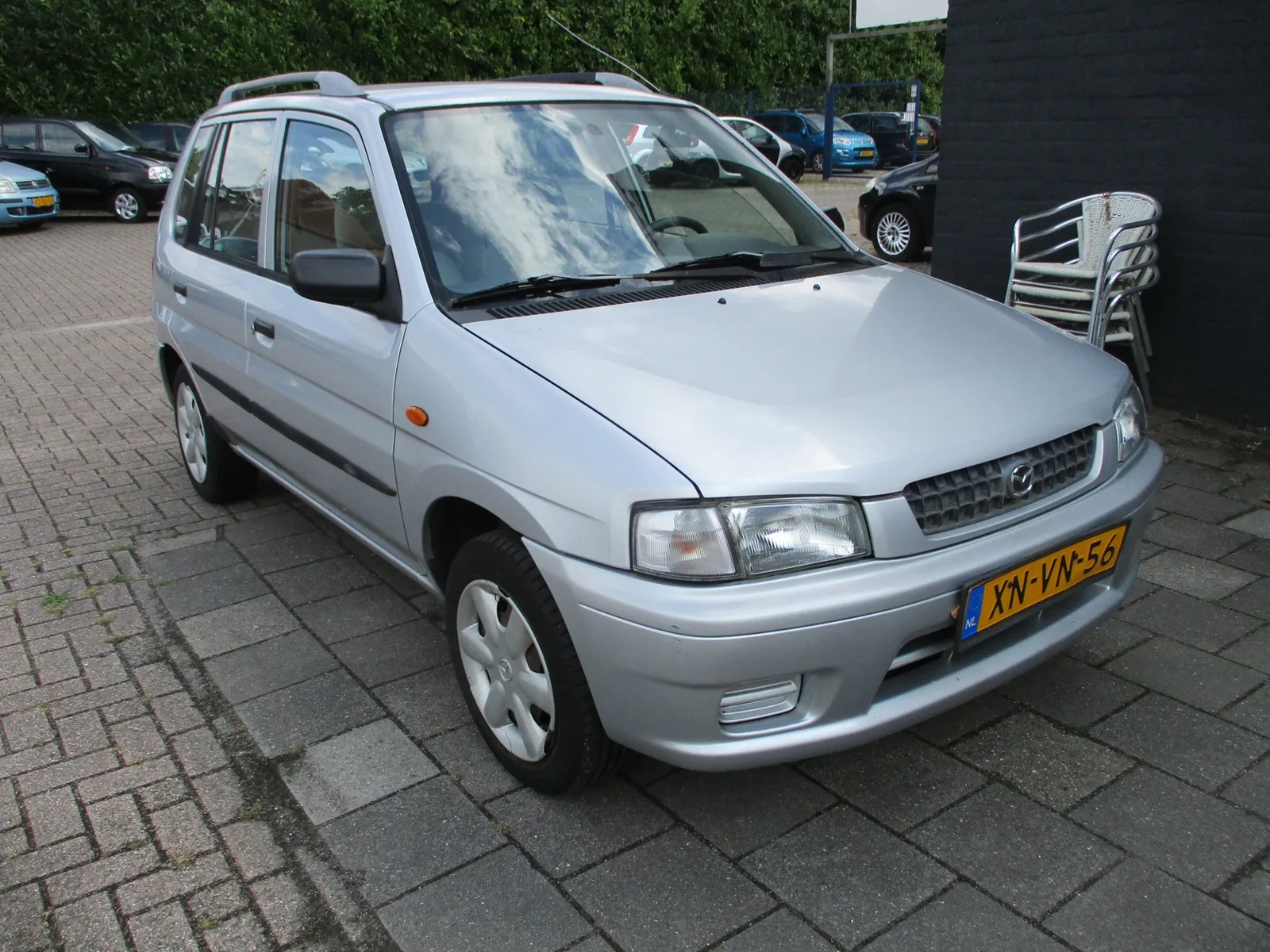 Mazda Demio (1999) — foto 1