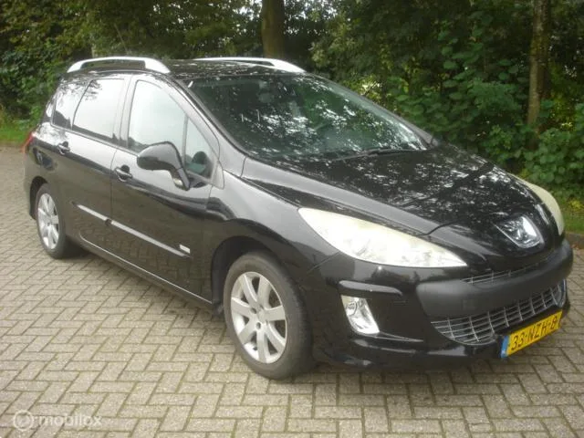 Peugeot 308 (2011) — foto 1