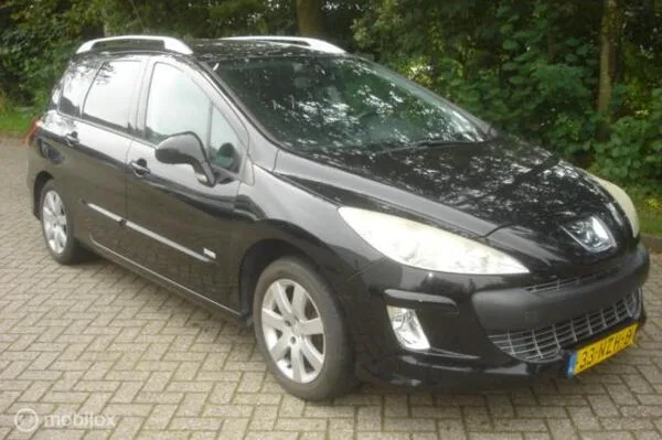 Peugeot 308 (2011) — foto 1