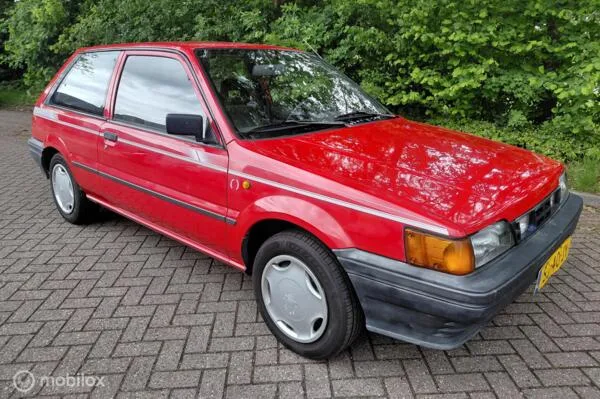 Nissan Sunny (1987) — foto 1