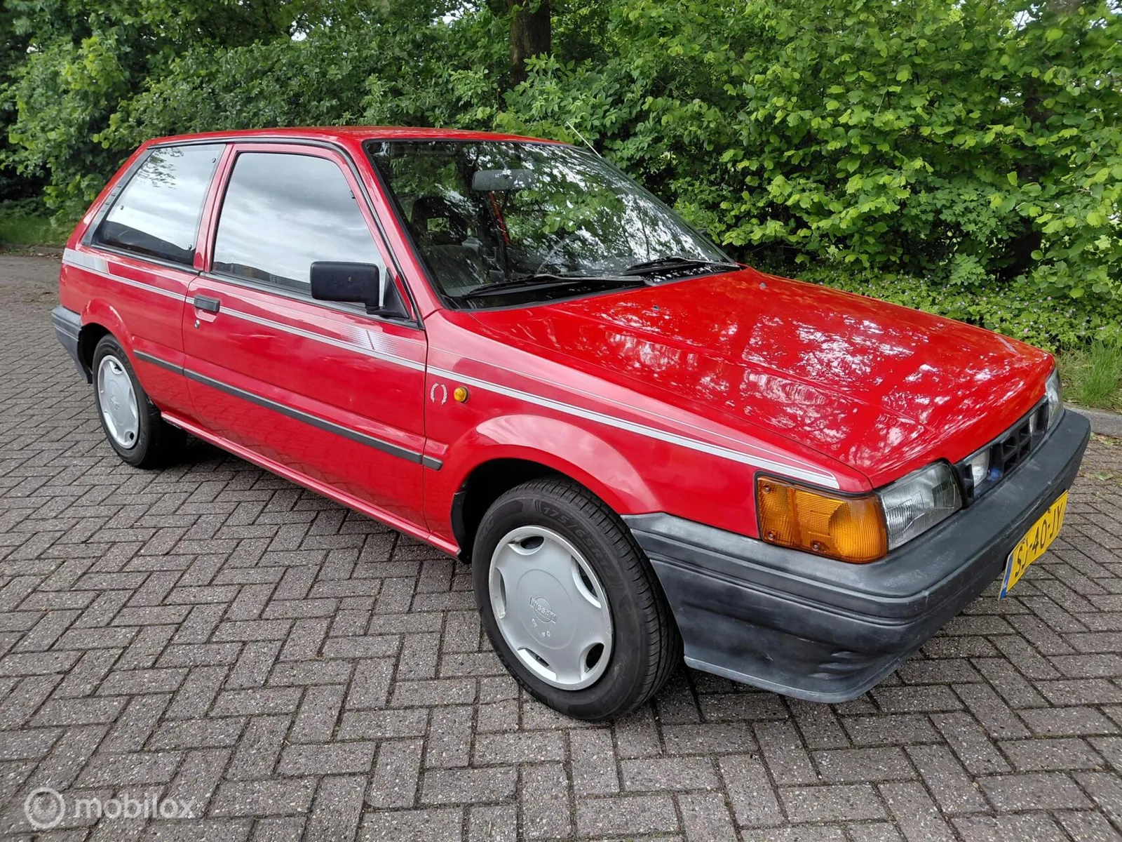 Nissan Sunny (1987) — foto 1