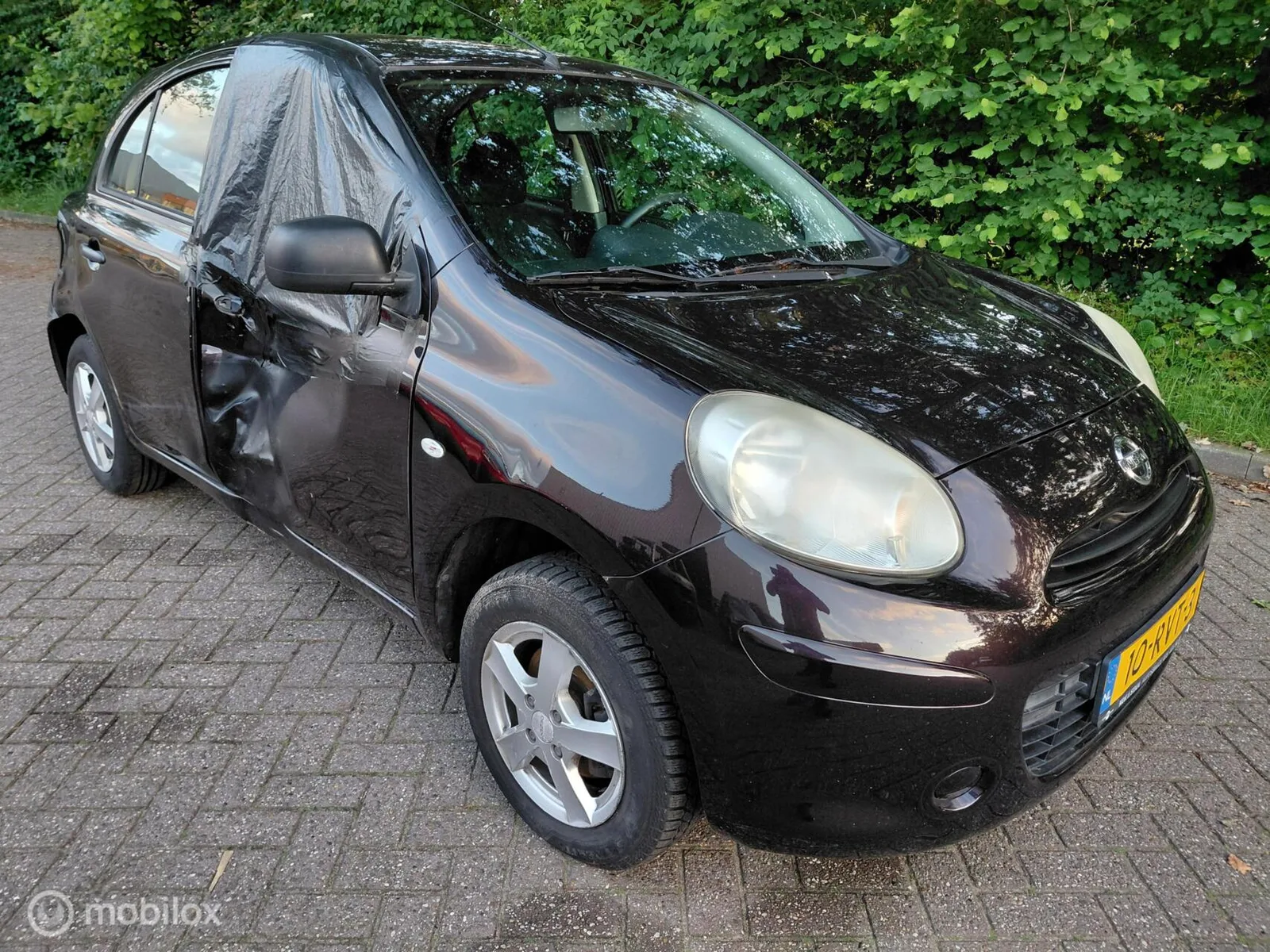 Nissan Micra (2011) — foto 1