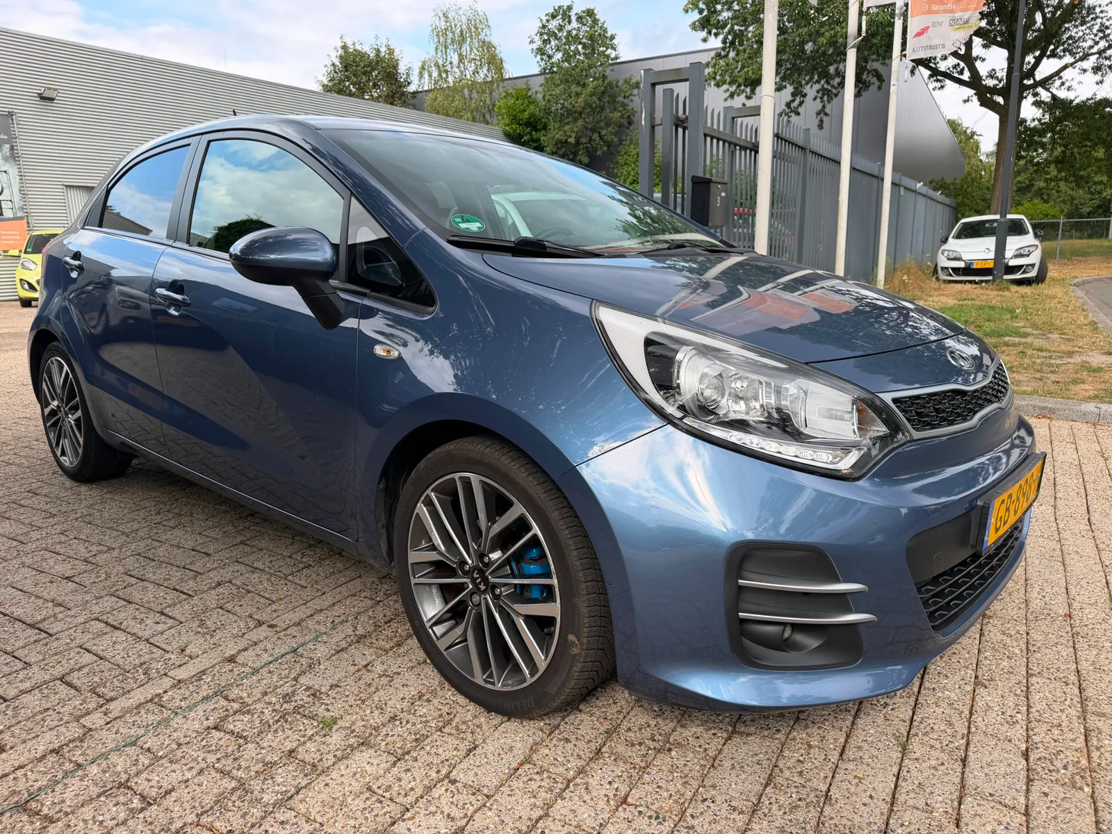 Kia Rio (2015) — foto 1