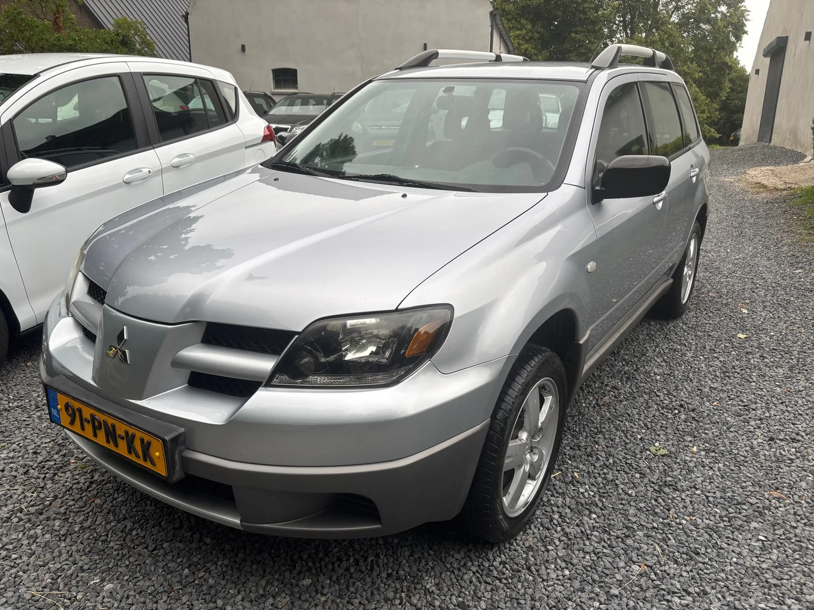 Mitsubishi Outlander (2004) — foto 1