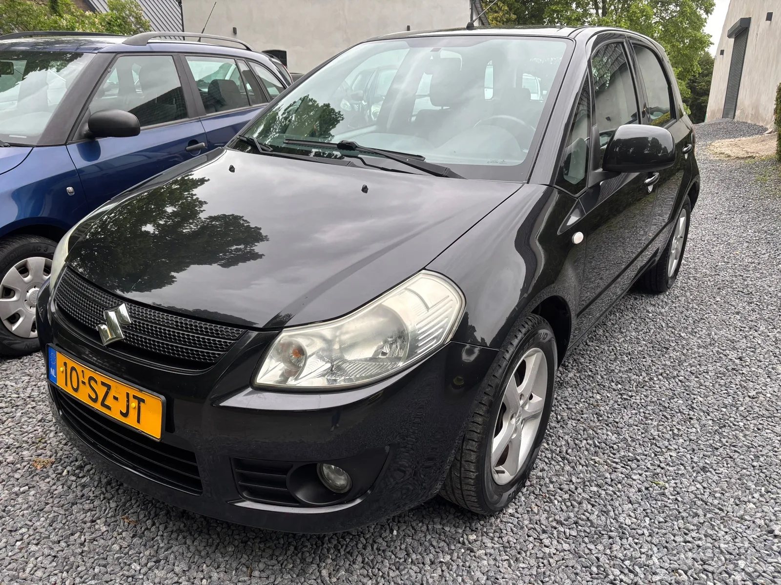 Suzuki SX4 (2006) — foto 1