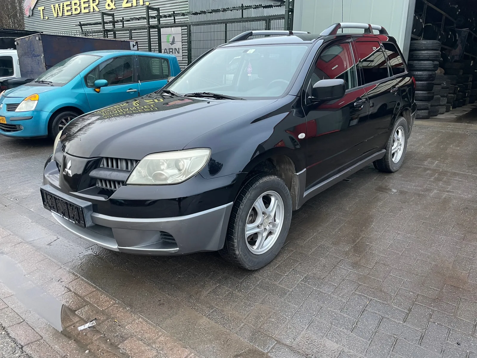 Mitsubishi Outlander (2005) — foto 1