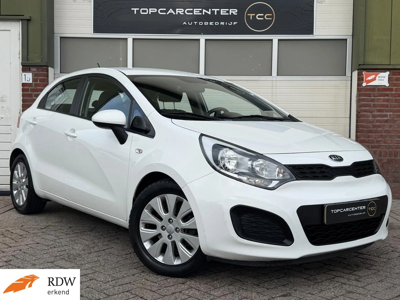 Kia Rio (2012) — foto 1