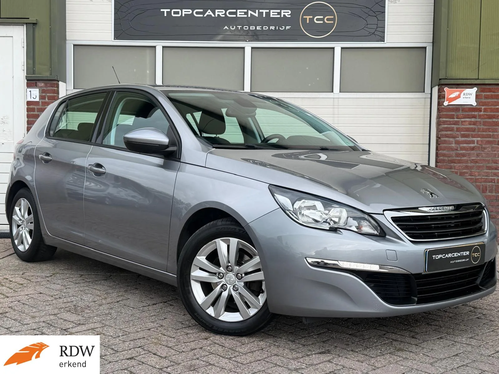 Peugeot 308 (2013) — foto 1