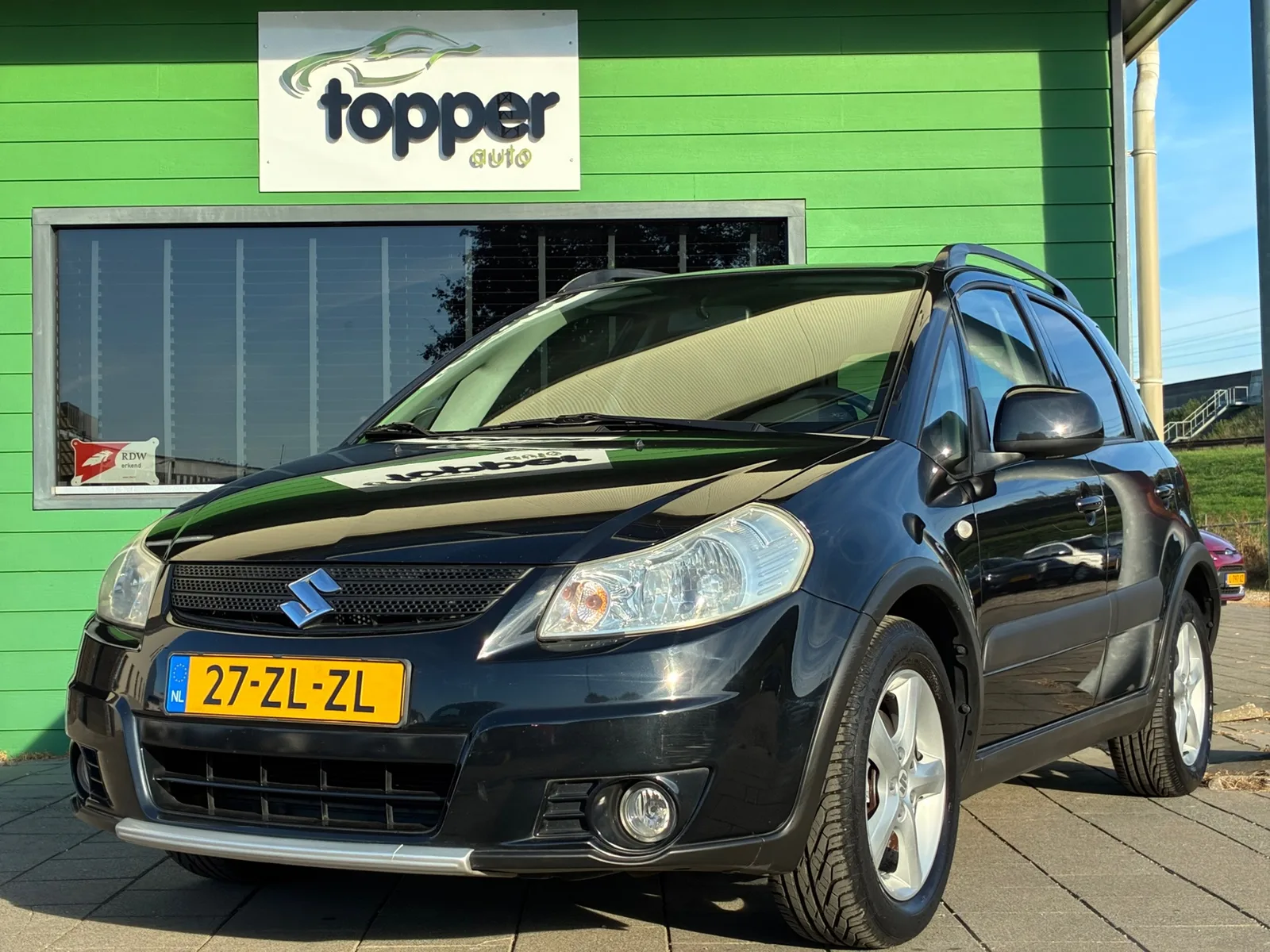 Suzuki SX4 (2008) — foto 1