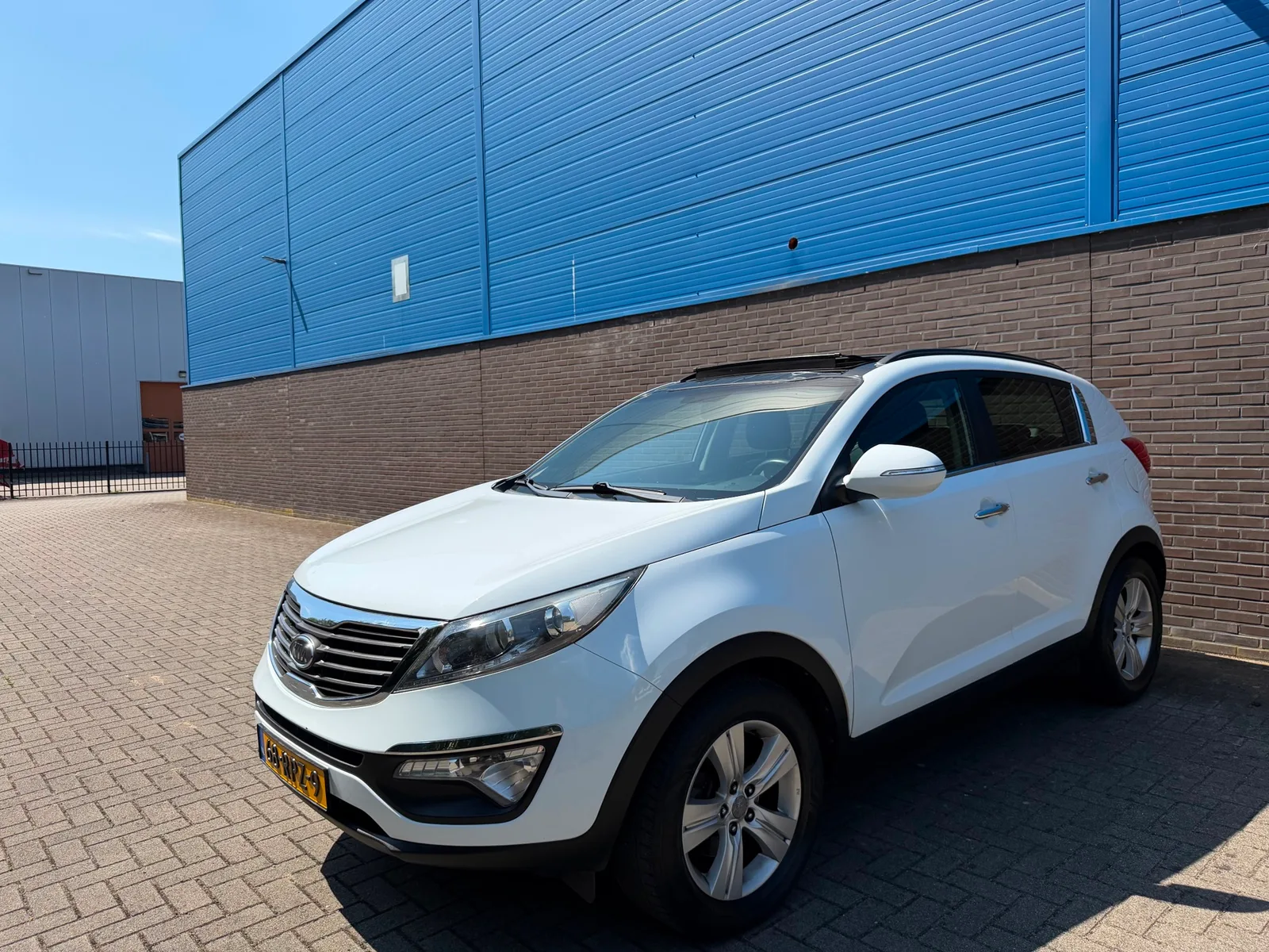 Kia Sportage (2011) — foto 1