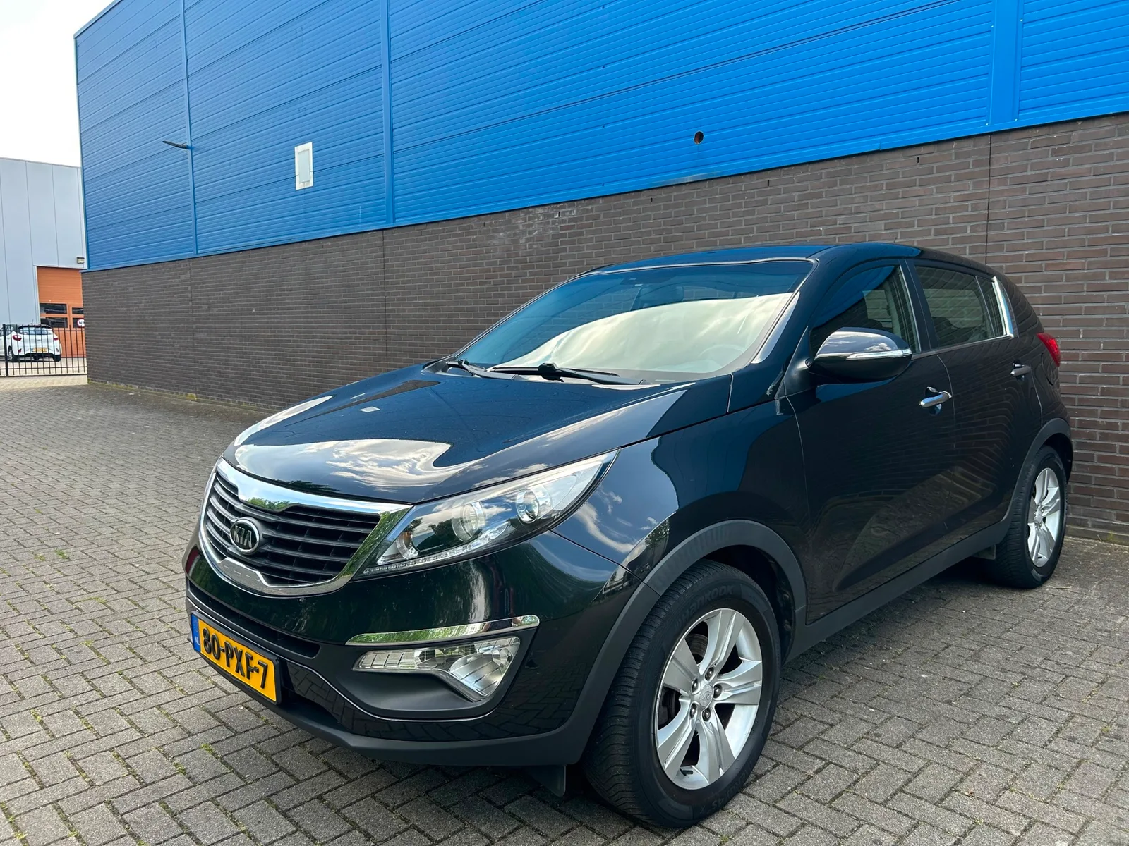 Kia Sportage (2011) — foto 1