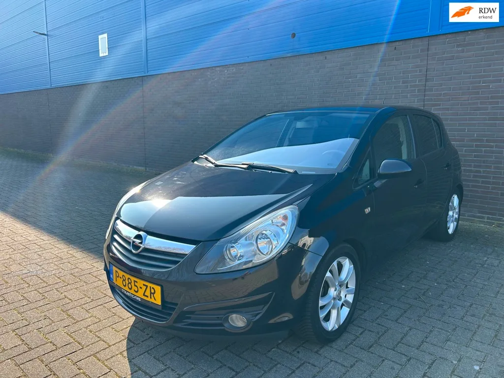Opel Corsa (2009) — foto 1