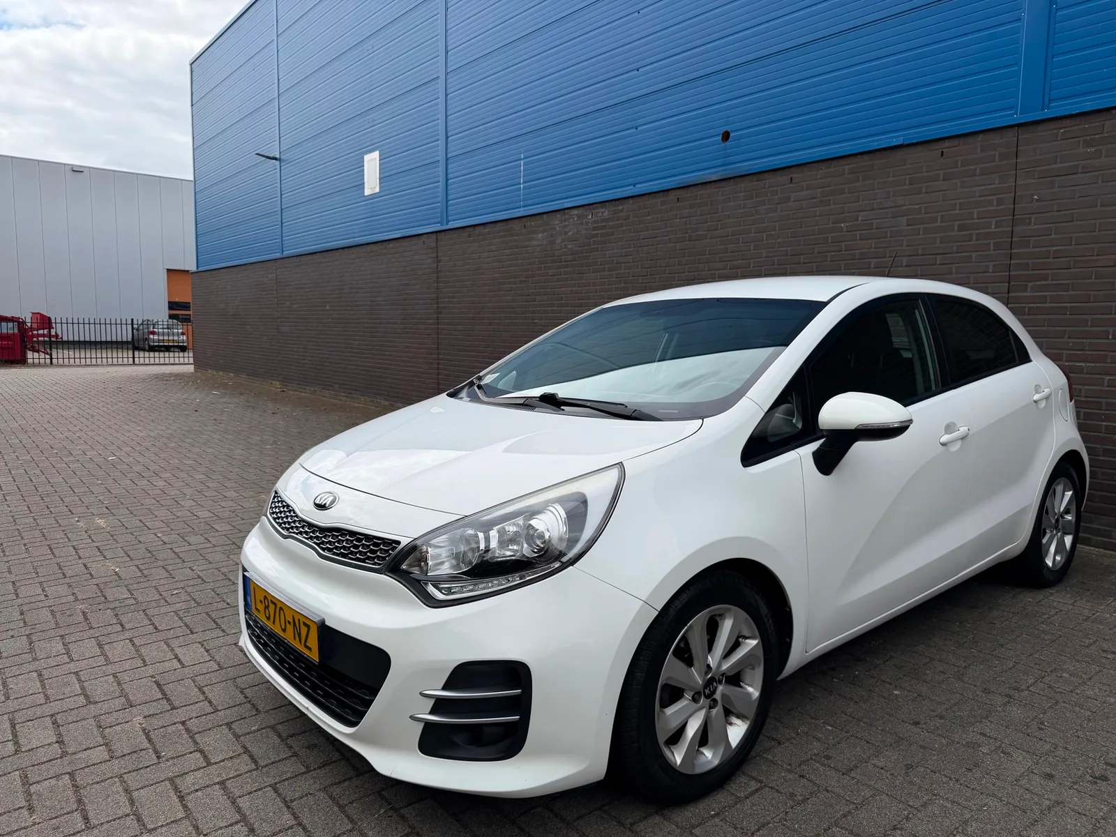 Kia Rio (2015) — foto 1