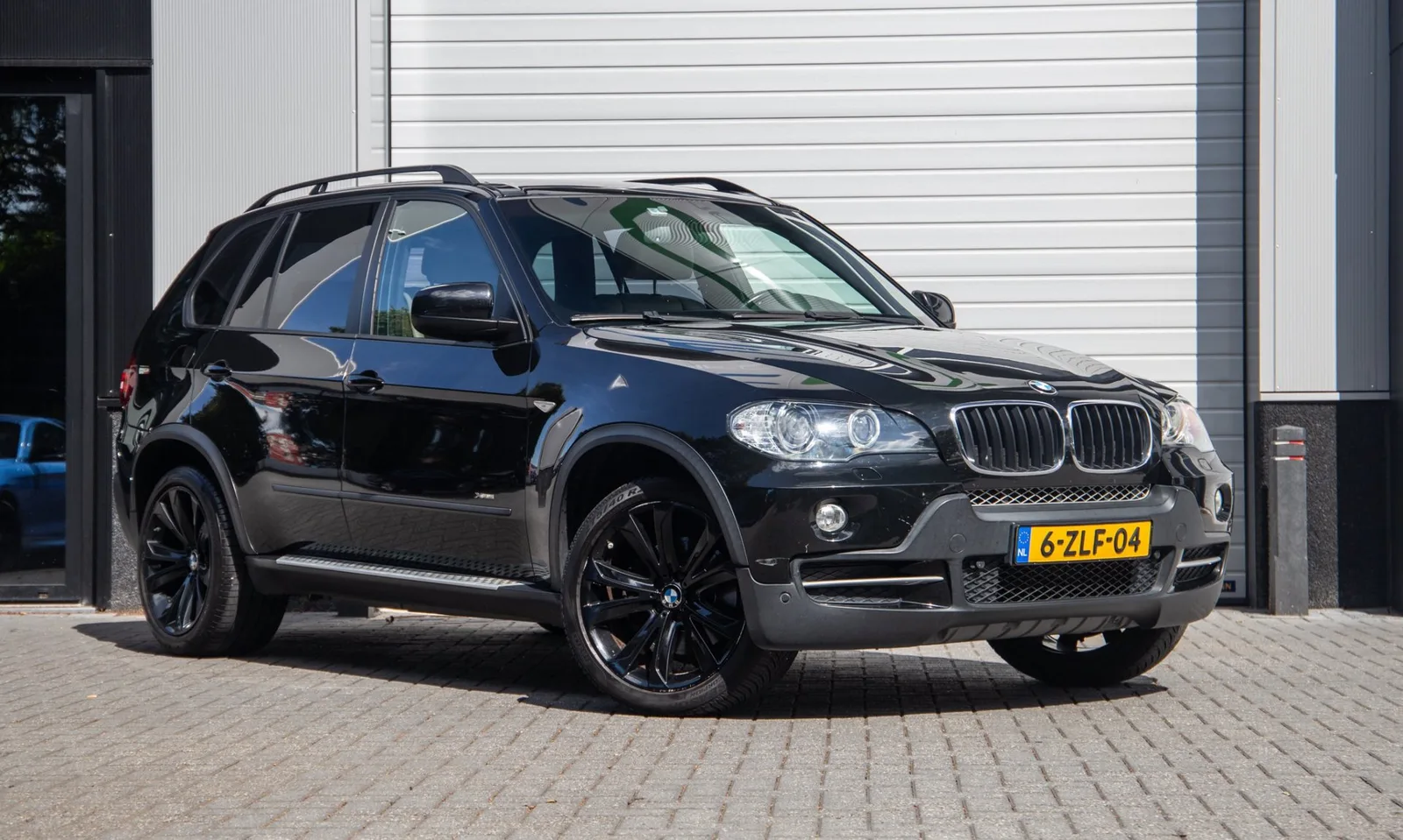 BMW X5 (2009) — foto 1