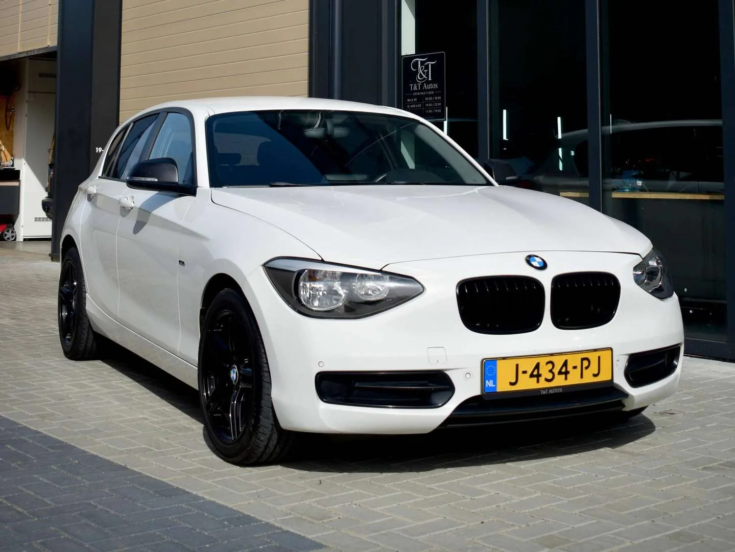 BMW 1-Serie (2011) — foto 1